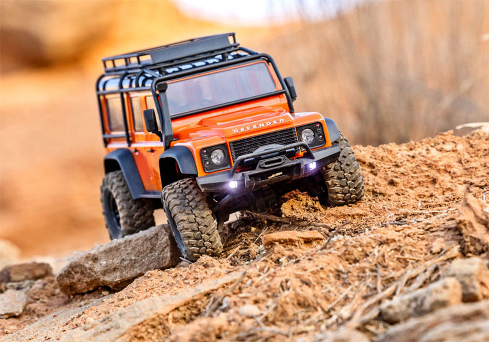 
                  
                    Traxxas TRX4M 1/18 Land Rover Defender 4x4 RC Trail Crawler (Orange)
                  
                